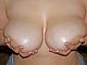 pictures a women covering thier breast